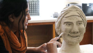 11th grader sculpts clay bust